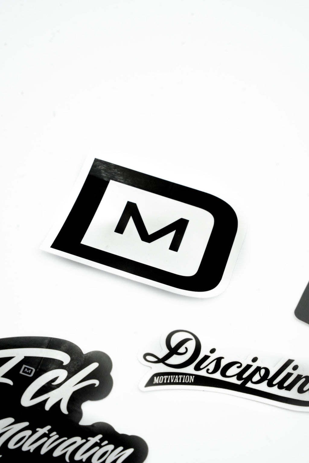 D > M Logo Sticker
